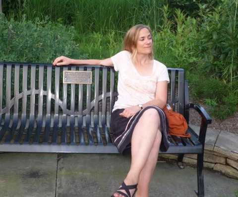 Tracy sitting on the Bench by the Road at Oberlin, Ohio