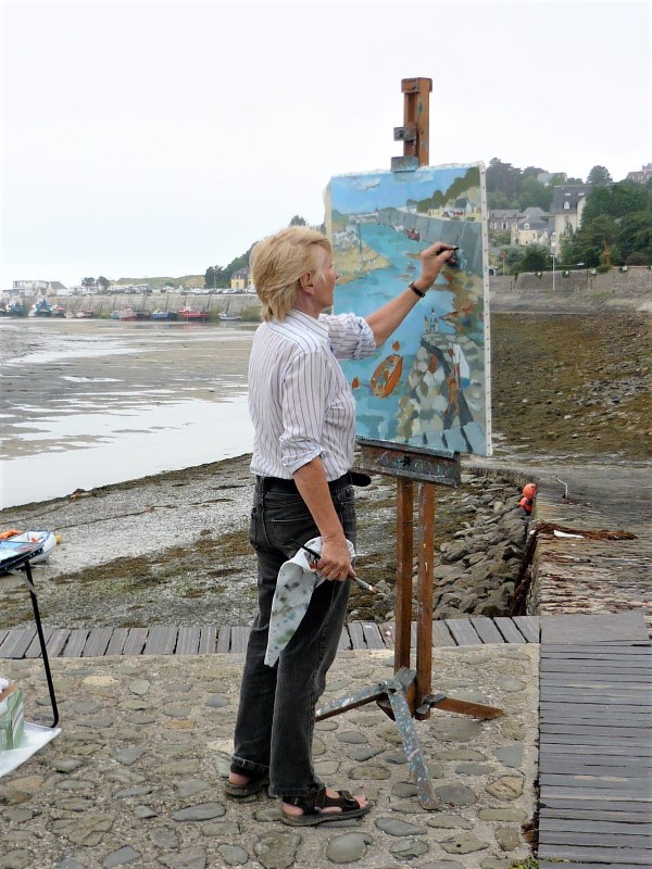 Lynn painting on the quayside at Carteret